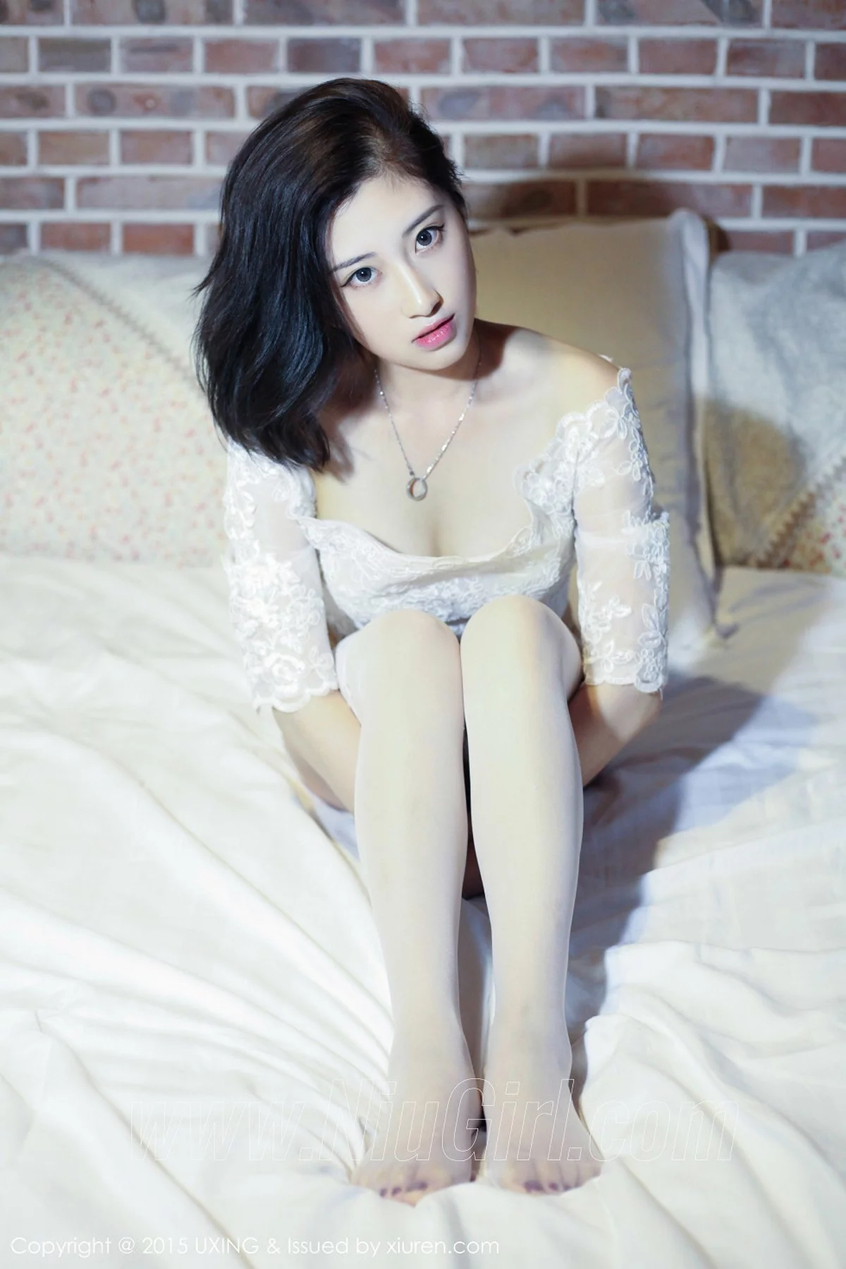 M940-[UXING优星馆]Vol.014_嫩模Rialer傅雅慧白色蕾丝吊带丝袜性感翘臀写真39P 优星馆-第34张