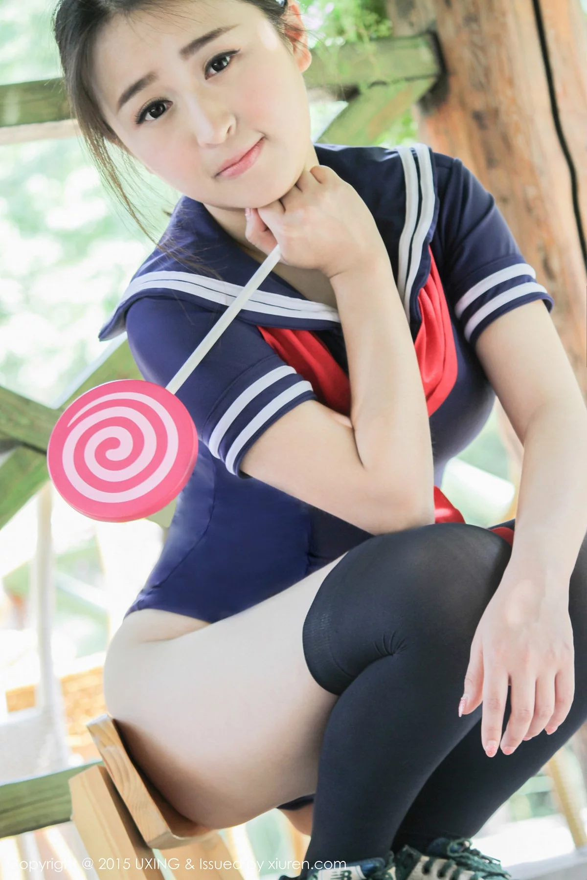 M940-[UXING优星馆]Vol.017_嫩模煊煊sunny爱吃棒棒糖的连体泳装妹子性感写真50P 优星馆-第9张
